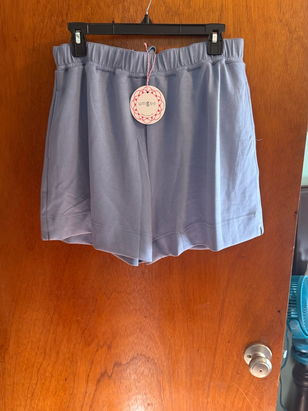 Umgee Lavender-Blue High Waist Pull-On Shorts Dress up or down. Small leg slits